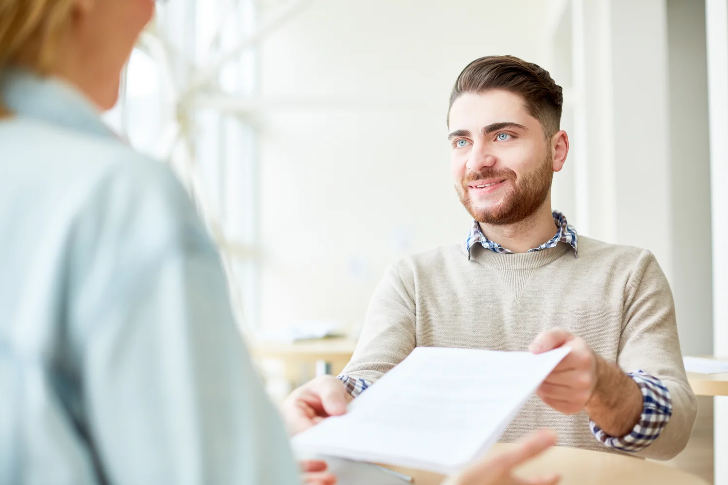 Candidate discussing qualifications during an interview