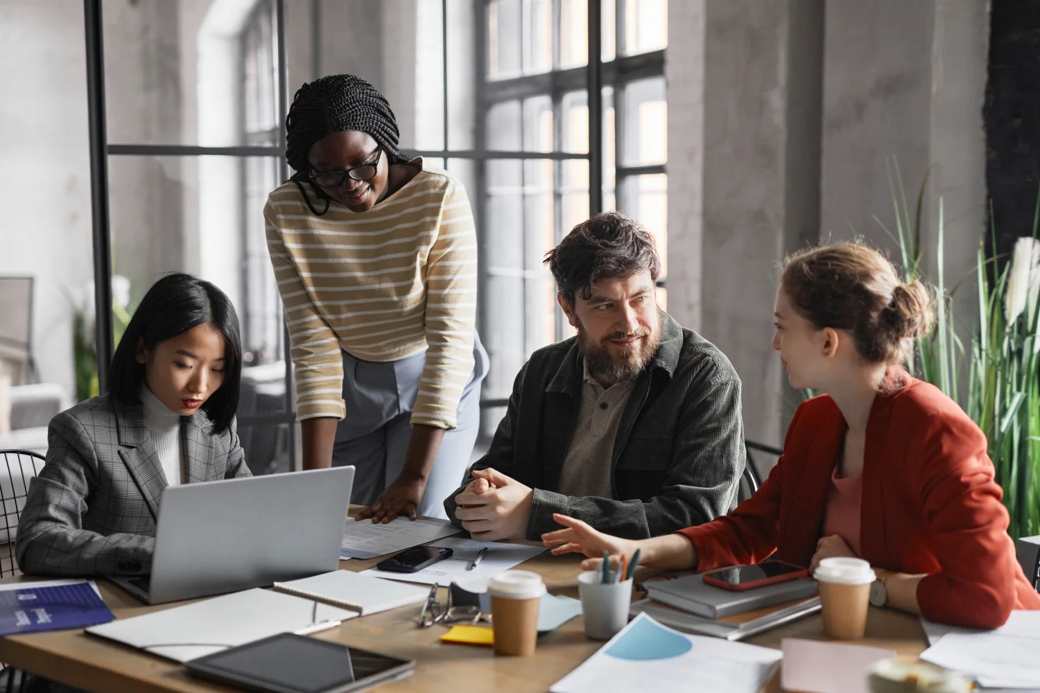 Professionals collaborating around a table